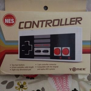 2 NES controllers with cord , brand new in box.